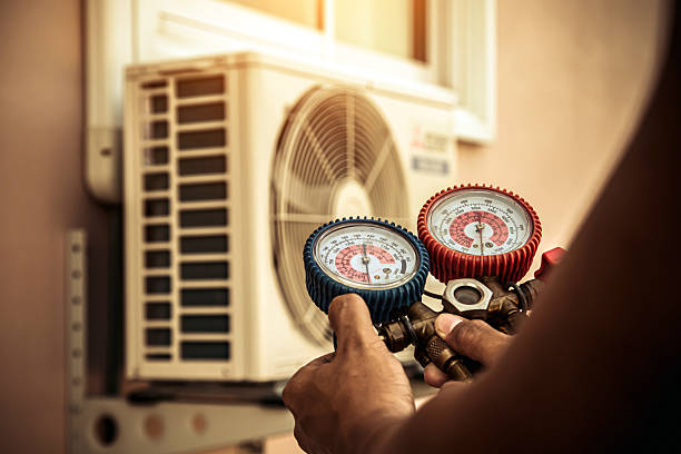 Professional Air Conditioning Service technician working in Longboat Key, FL